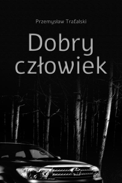 okładka opowiadania dobry człowiek a na niej widoczna jest przednia część czarnego samochodu jadącego przez las w nocy.